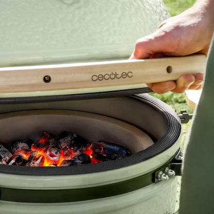 Cecotec Kamado Barbacoa de Carbón Cerámica Ø 60cm DragonFire 6000, Asa, Ahuma, Hornea y Guisa, Resistente a 1000°C, Soporte de Hierro Fundido, Cámara Hermética, Con Ruedas y Termómetro